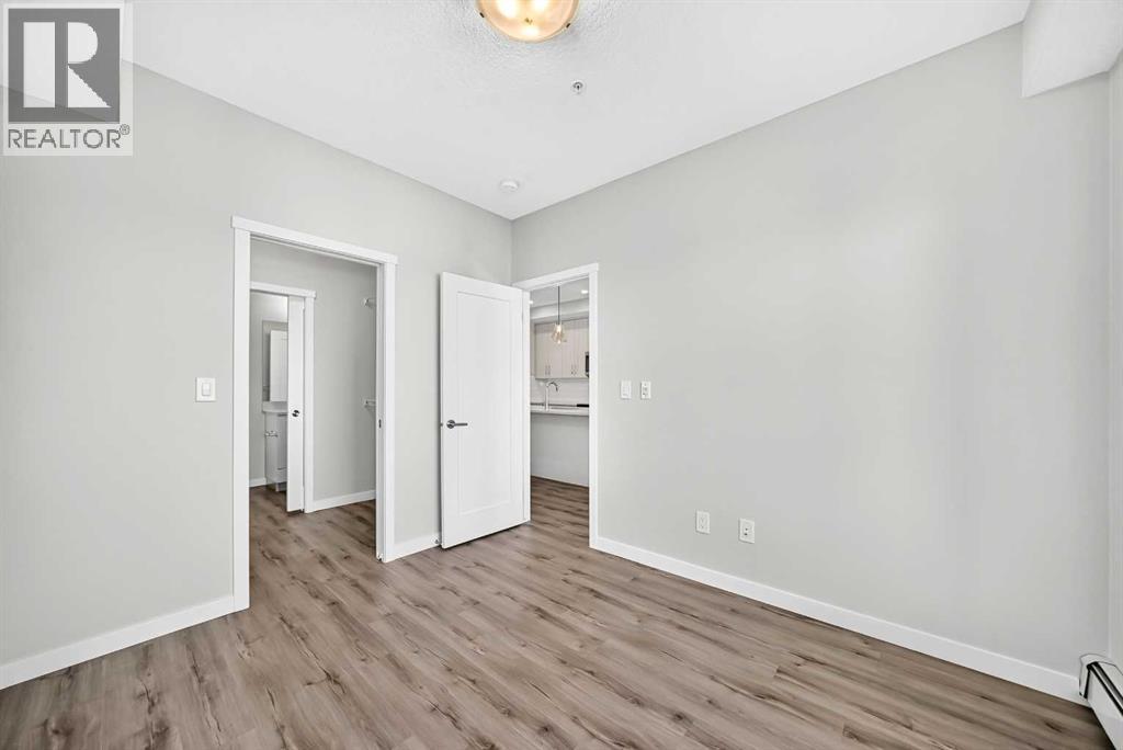 205, 71 Shawnee Common SW, Calgary, Alberta  T2Y 0R2 - Photo 15 - A2345208