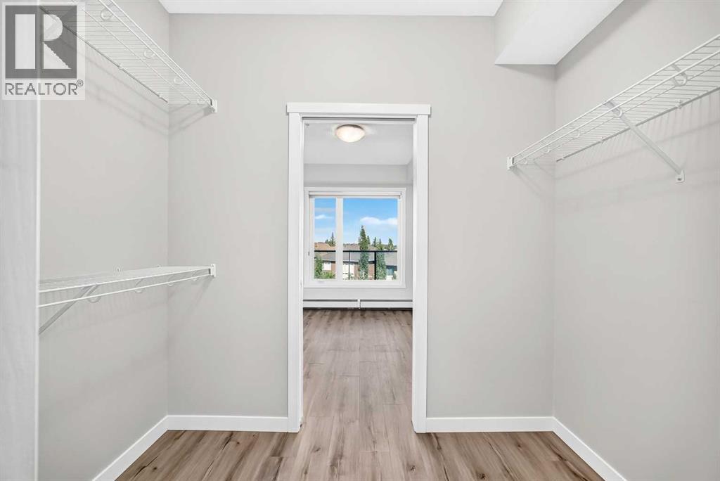 205, 71 Shawnee Common SW, Calgary, Alberta  T2Y 0R2 - Photo 19 - A2345208