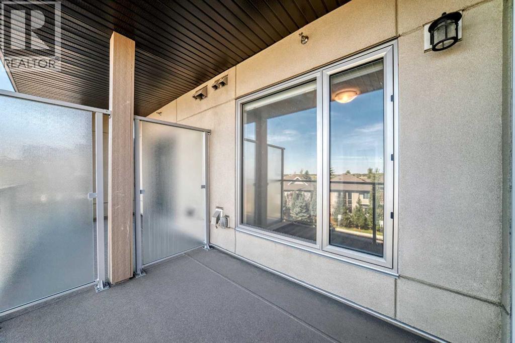 205, 71 Shawnee Common SW, Calgary, Alberta  T2Y 0R2 - Photo 24 - A2345208