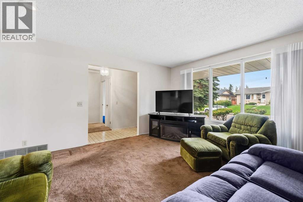 7944 Huntington Road NE, Calgary, Alberta  T2K 5A3 - Photo 9 - A2345682