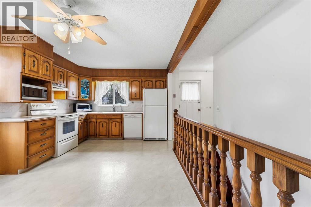 7944 Huntington Road NE, Calgary, Alberta  T2K 5A3 - Photo 10 - A2345682