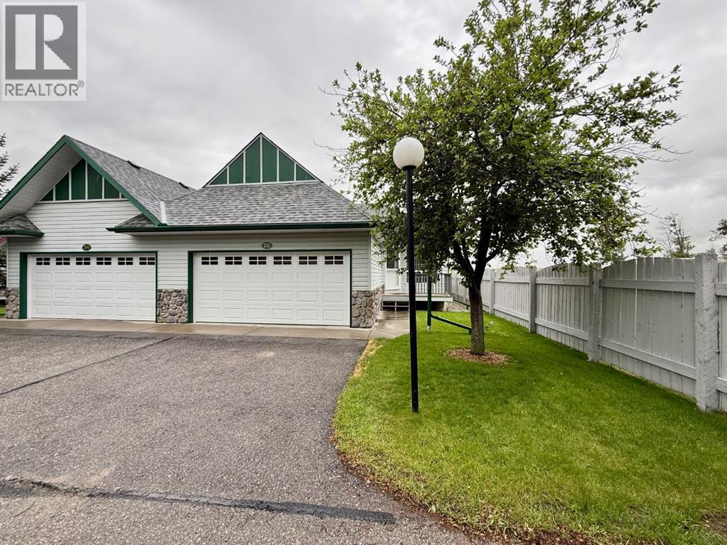 211 Baker Creek Place SW, High River, Alberta  T1V 1V6 - Photo 1 - A2320817
