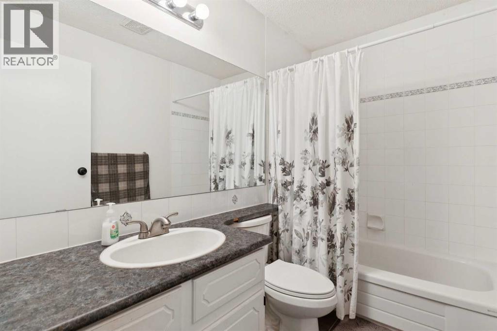 91 Deerfield Drive SE, Calgary, Alberta  T2J 6T9 - Photo 11 - A2334586