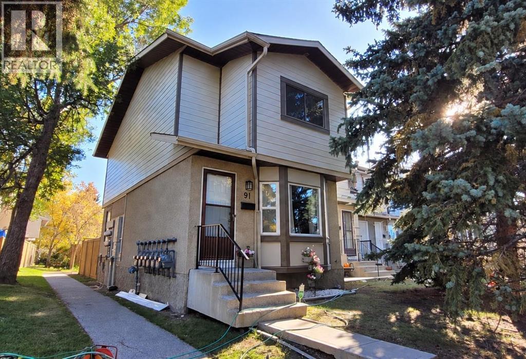 91 Deerfield Drive SE, Calgary, Alberta  T2J 6T9 - Photo 1 - A2334586