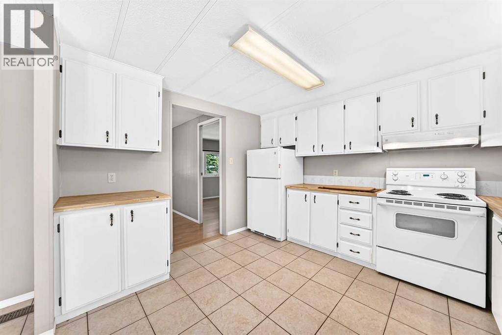127 Huntwell Place NE, Calgary, Alberta  T2K 5T2 - Photo 16 - A2345973