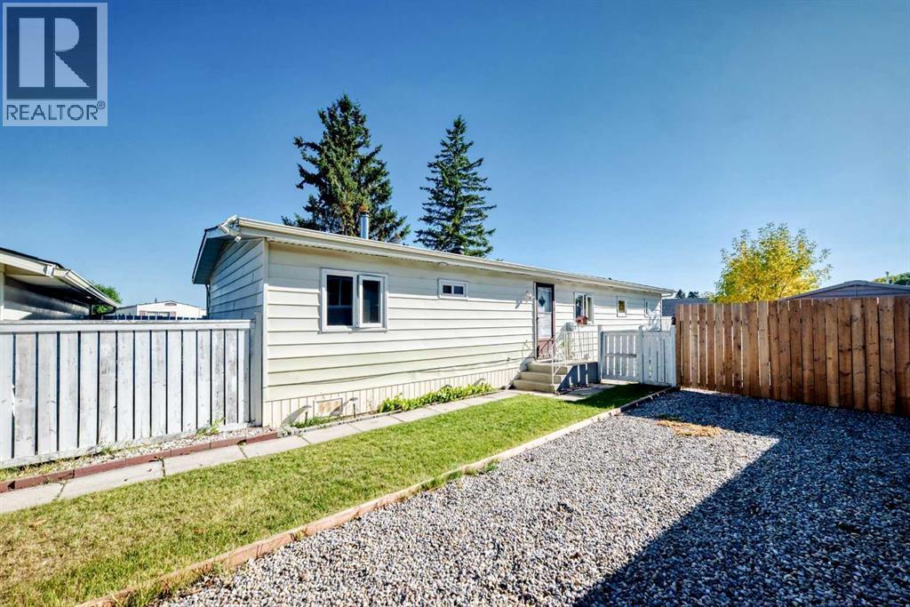 127 Huntwell Place NE, Calgary, Alberta  T2K 5T2 - Photo 4 - A2345973