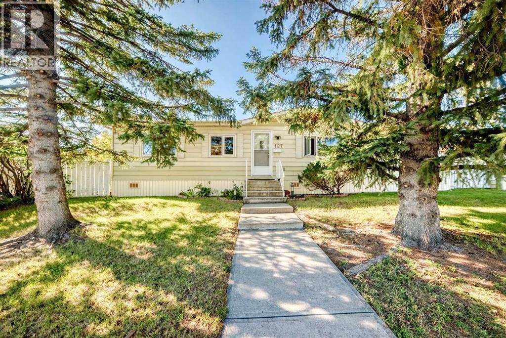127 Huntwell Place NE, Calgary, Alberta  T2K 5T2 - Photo 2 - A2345973
