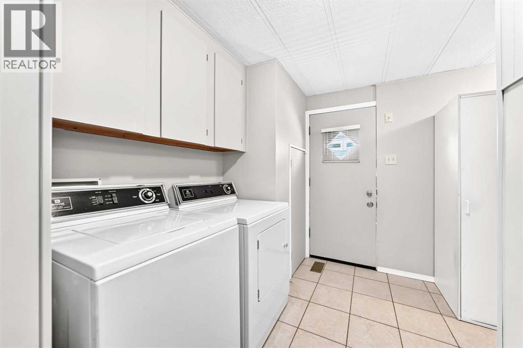 127 Huntwell Place NE, Calgary, Alberta  T2K 5T2 - Photo 27 - A2345973