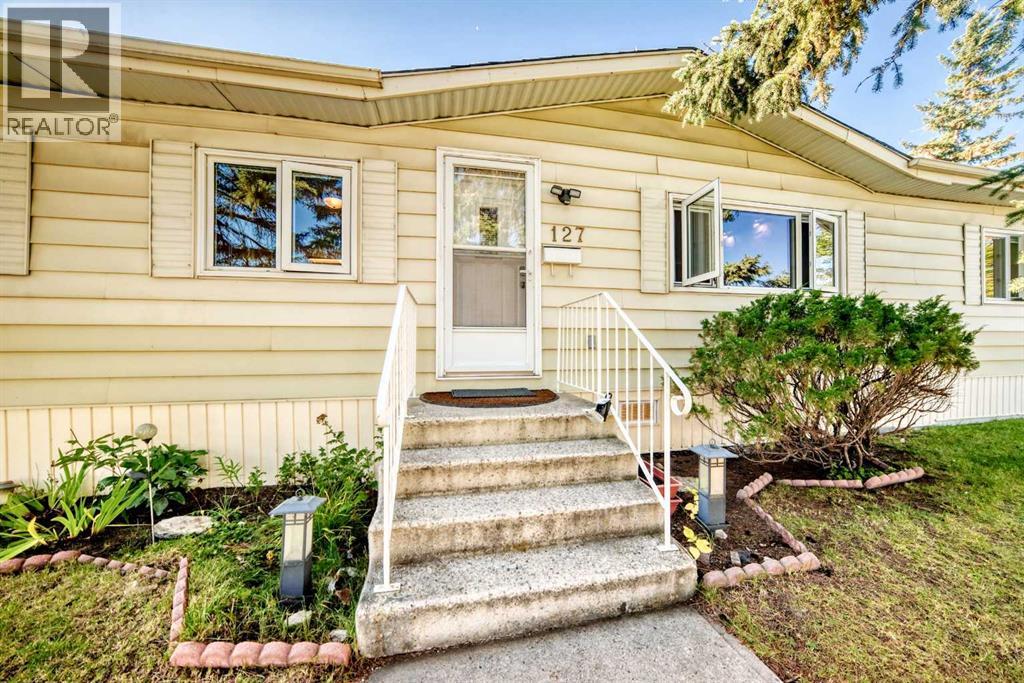 127 Huntwell Place NE, Calgary, Alberta  T2K 5T2 - Photo 1 - A2345973