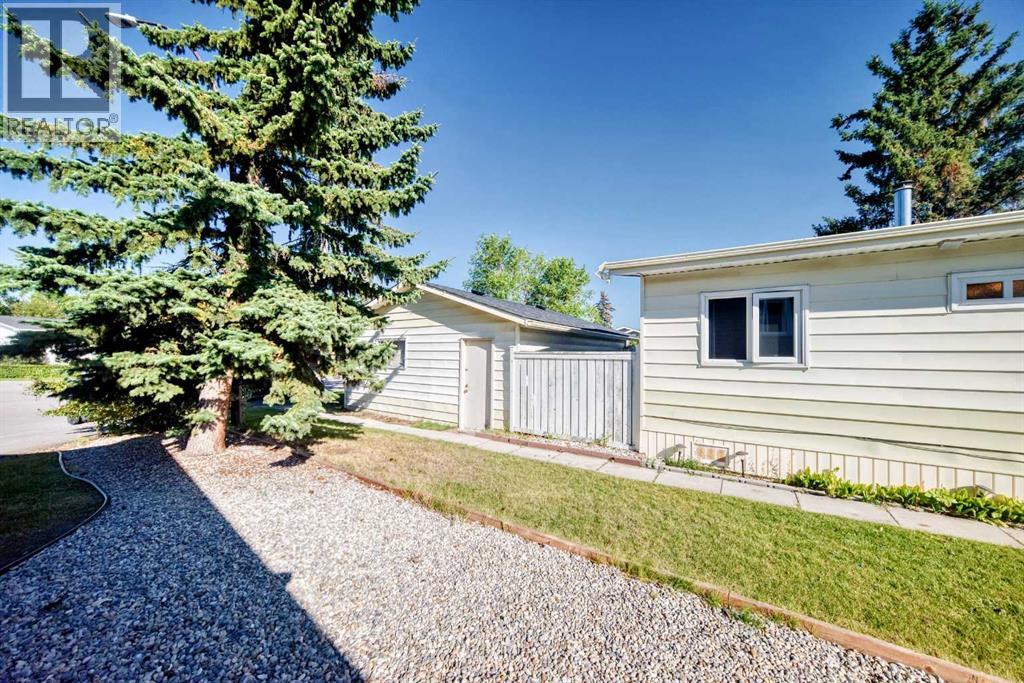 127 Huntwell Place NE, Calgary, Alberta  T2K 5T2 - Photo 5 - A2345973