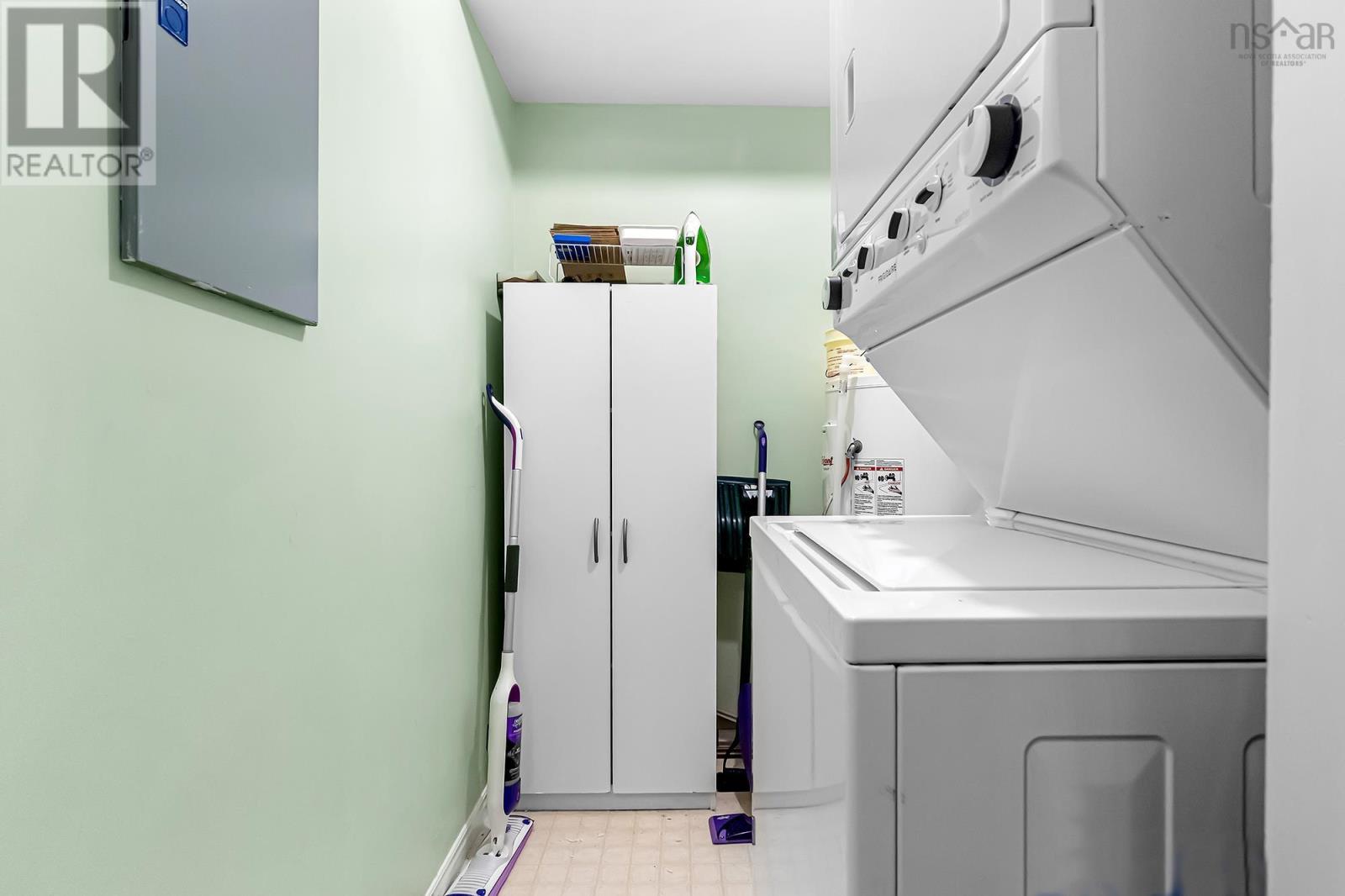 Utility Room with Washer Dryer and Hot Water Heater