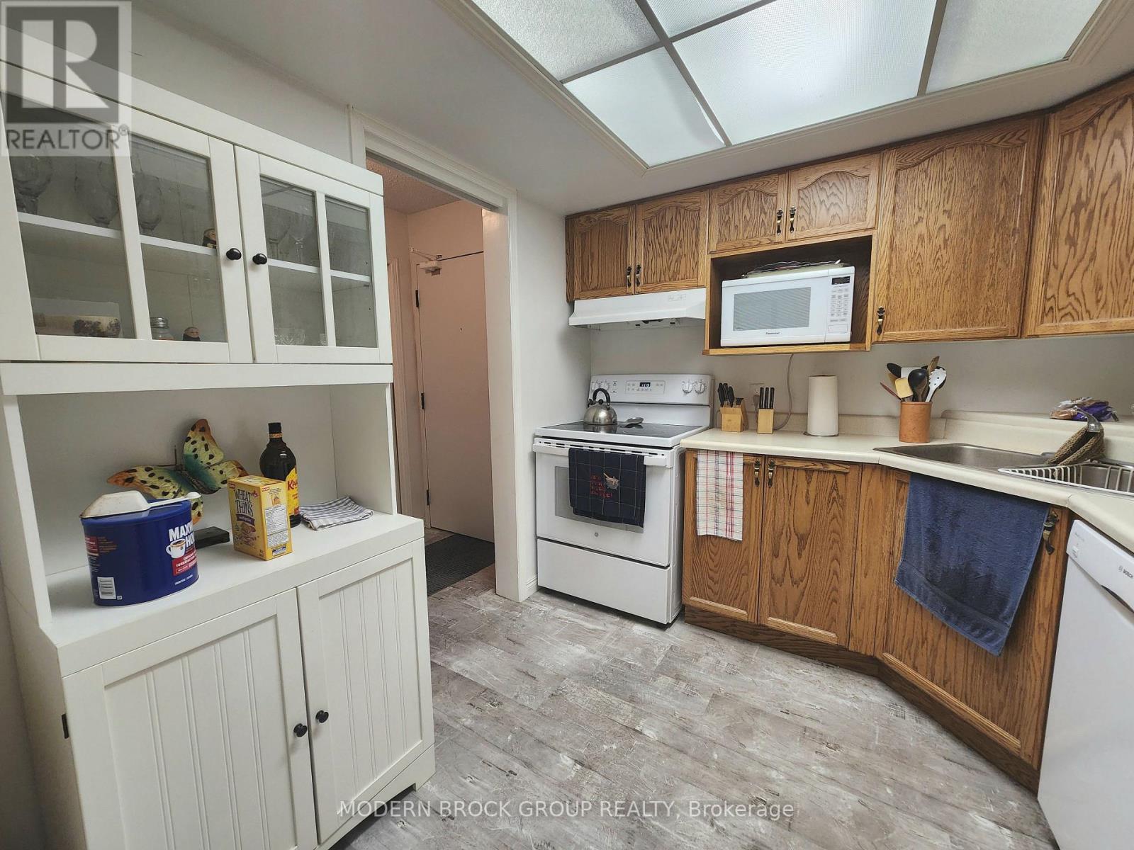 Extra white storage cabinet included