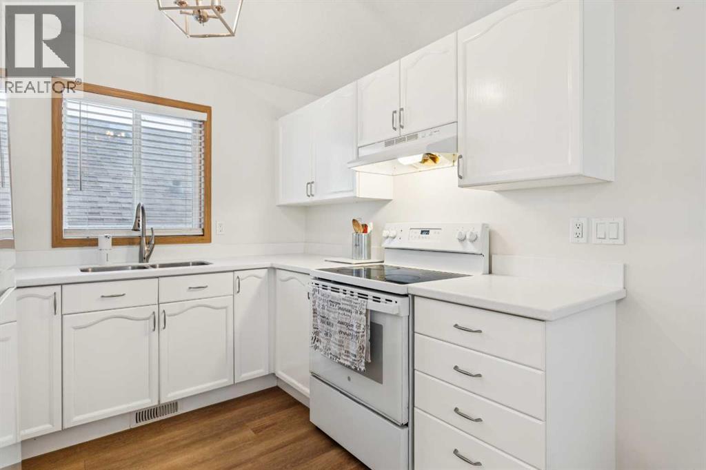 99 Mt Allan Circle, Calgary, Alberta  T2Z 2S4 - Photo 7 - A2342520