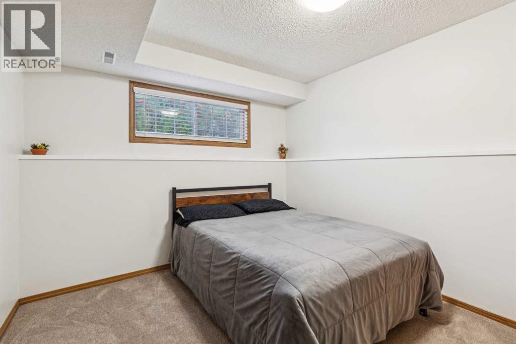 99 Mt Allan Circle, Calgary, Alberta  T2Z 2S4 - Photo 18 - A2342520