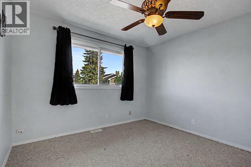 2444 Woodview Drive SW, Calgary, Alberta  T2W 4X7 - Photo 11 - A2343829