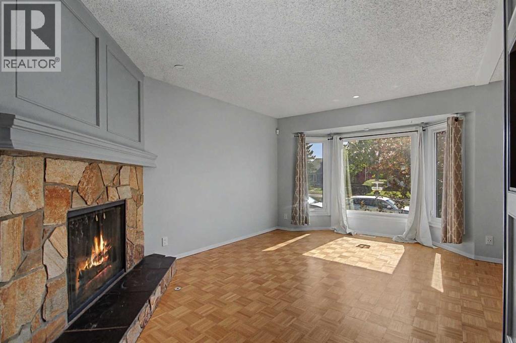 2444 Woodview Drive SW, Calgary, Alberta  T2W 4X7 - Photo 3 - A2343829