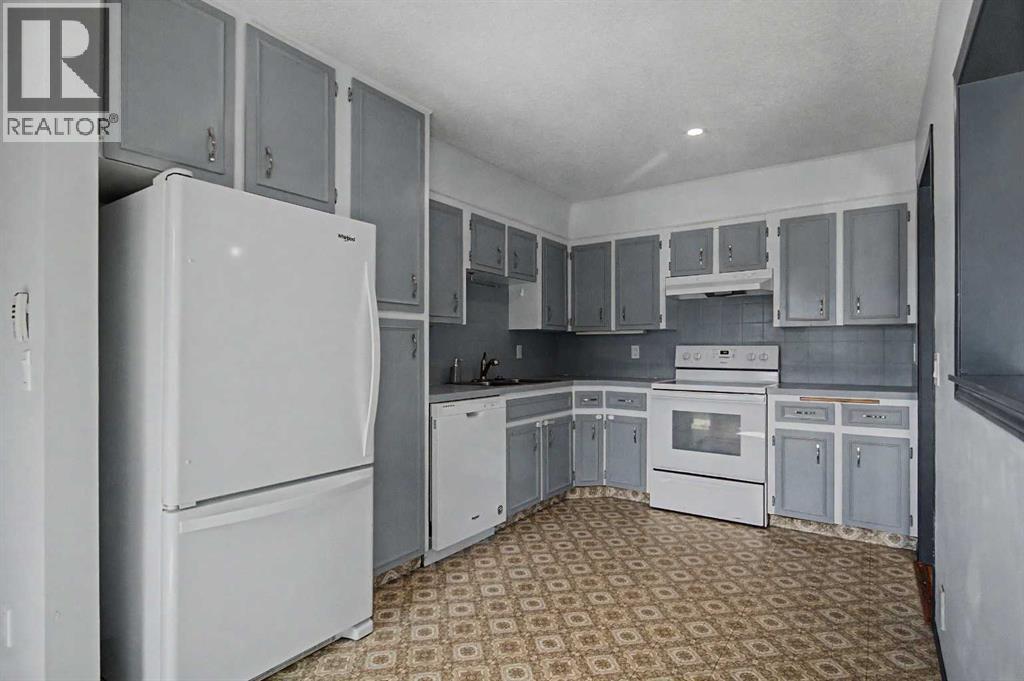 2444 Woodview Drive SW, Calgary, Alberta  T2W 4X7 - Photo 8 - A2343829