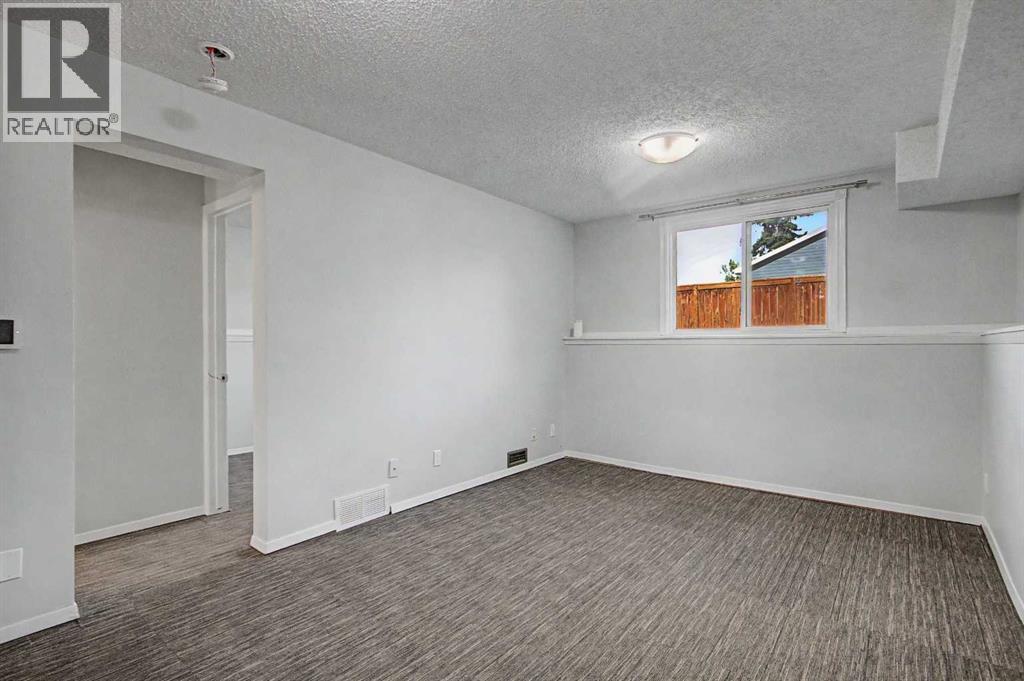 2444 Woodview Drive SW, Calgary, Alberta  T2W 4X7 - Photo 18 - A2343829
