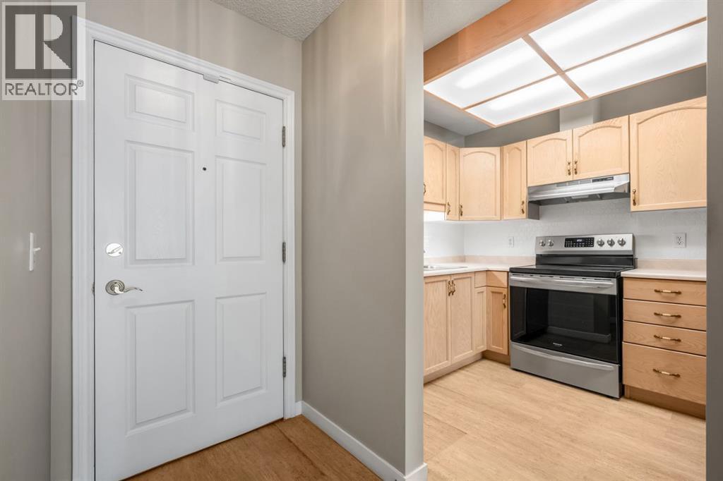 1108, 1108 Hawksbrow Point NW, Calgary, Alberta  T3G 4C9 - Photo 3 - A2346946