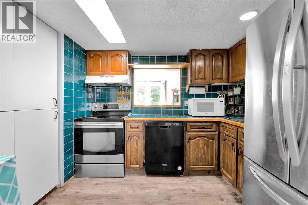 84a Cedarwood Hill Sw, Calgary, Alberta  T2W 3H5 - Photo 21 - A2345041