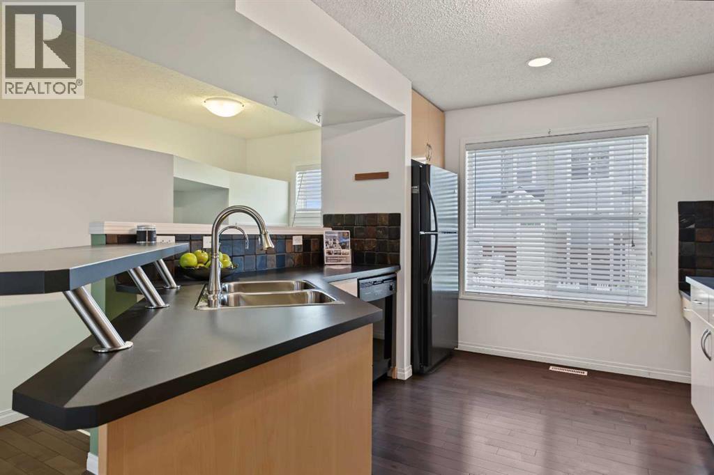 3240 New Brighton Gardens SE, Calgary, Alberta  T2Z 0A3 - Photo 6 - A2347067