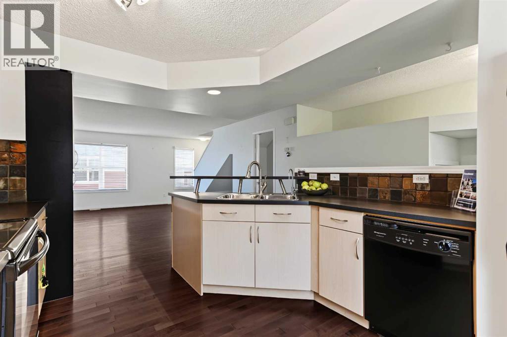 3240 New Brighton Gardens SE, Calgary, Alberta  T2Z 0A3 - Photo 7 - A2347067