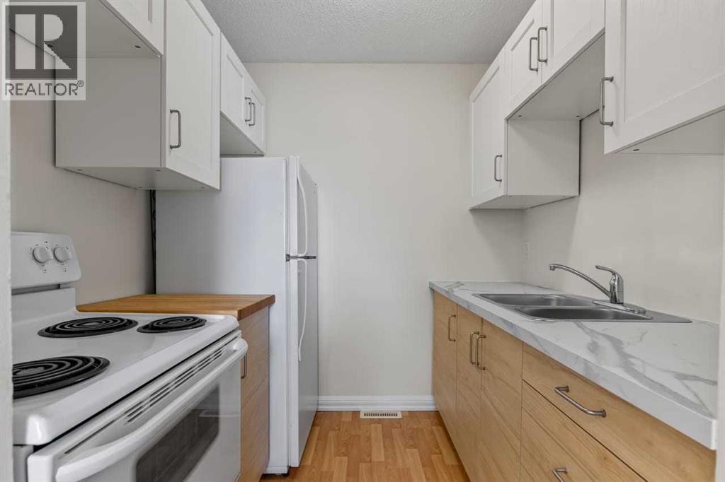 4, 4547 7 Avenue SE, Calgary, Alberta  T2A 5E4 - Photo 3 - A2343994