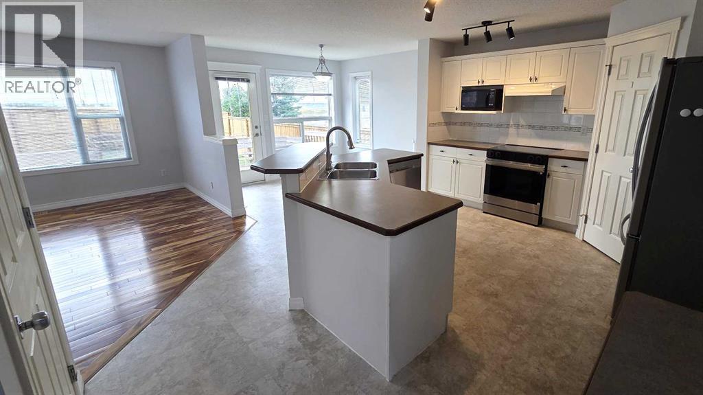 150 Hidden Hills Terrace NW, Calgary, Alberta  T3A 6E3 - Photo 7 - A2332026