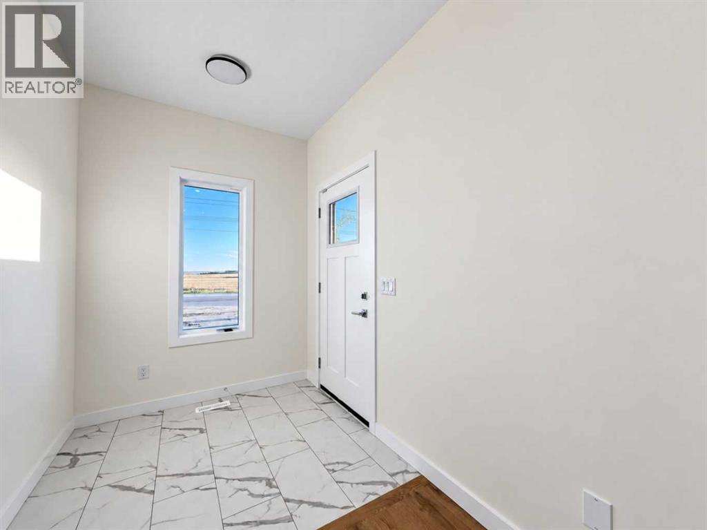 2337 Waterbury Road, Chestermere, Alberta  T1X 3L8 - Photo 5 - A2346535