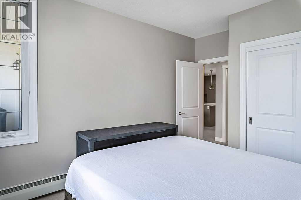 205, 39 Quarry Gate SE, Calgary, Alberta  T2X 3X2 - Photo 19 - A2344357