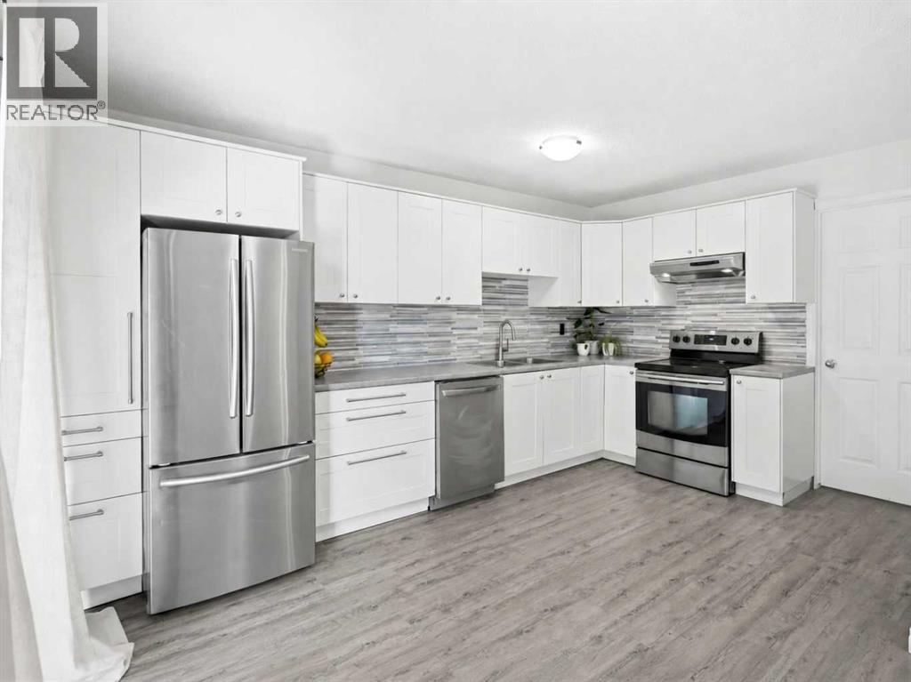 237 Sabrina Way SW, Calgary, Alberta  T2W 4J4 - Photo 9 - A2340712