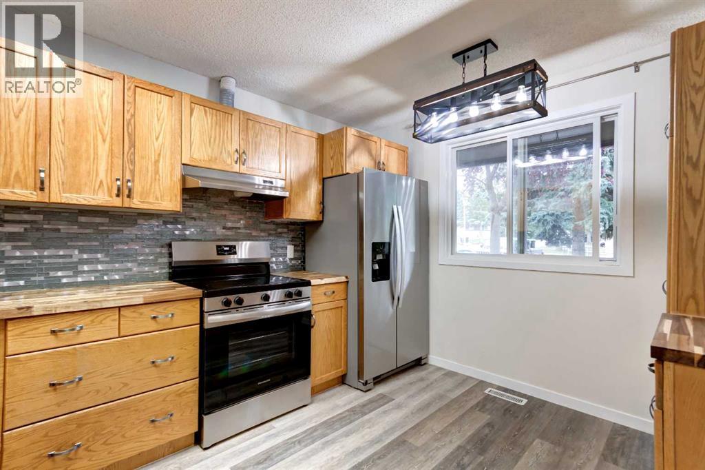 12, 310 Brookmere Road Sw, Calgary, Alberta T2W 2T7 - Photo 7 - A2341725