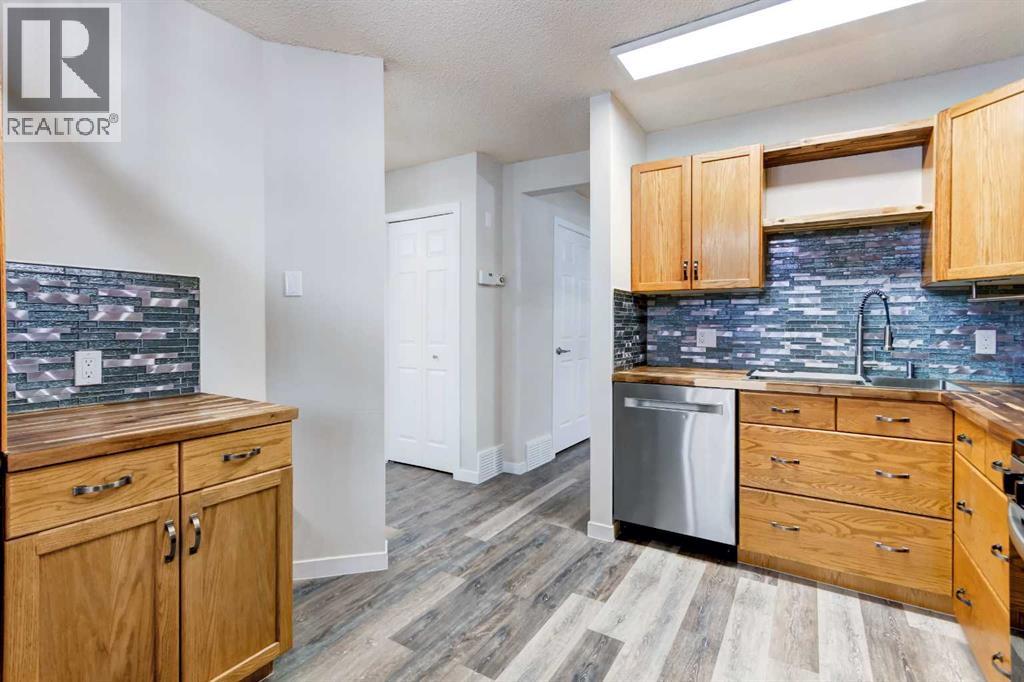 12, 310 Brookmere Road Sw, Calgary, Alberta T2W 2T7 - Photo 11 - A2341725