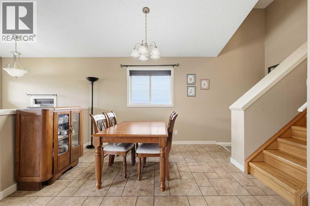 58 Cimarron Meadows Road, Okotoks, Alberta  T1S 1T6 - Photo 16 - A2345308