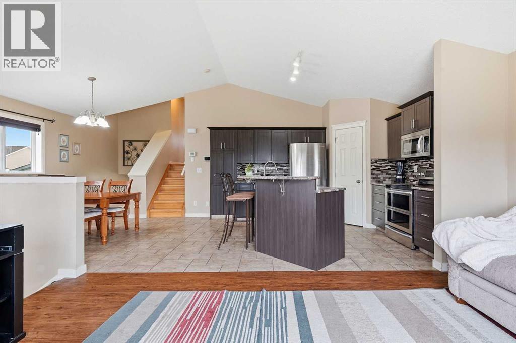 58 Cimarron Meadows Road, Okotoks, Alberta  T1S 1T6 - Photo 7 - A2345308