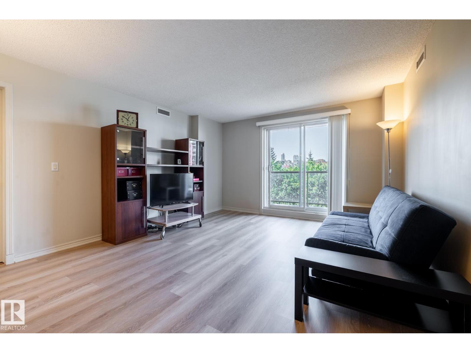 #406 10909 103 AV NW
