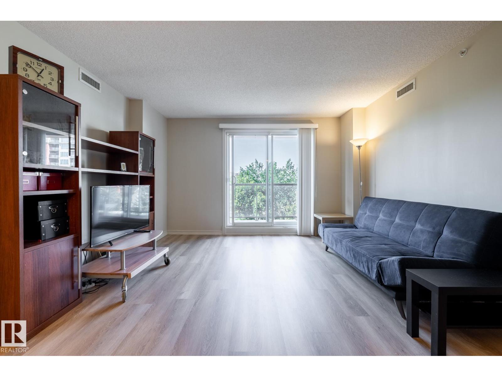 #406 10909 103 AV NW