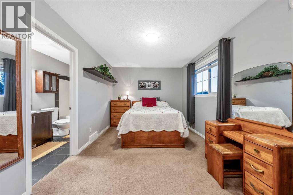 43 Arbours Circle NW, Langdon, Alberta  T0J 1X2 - Photo 22 - A2324848
