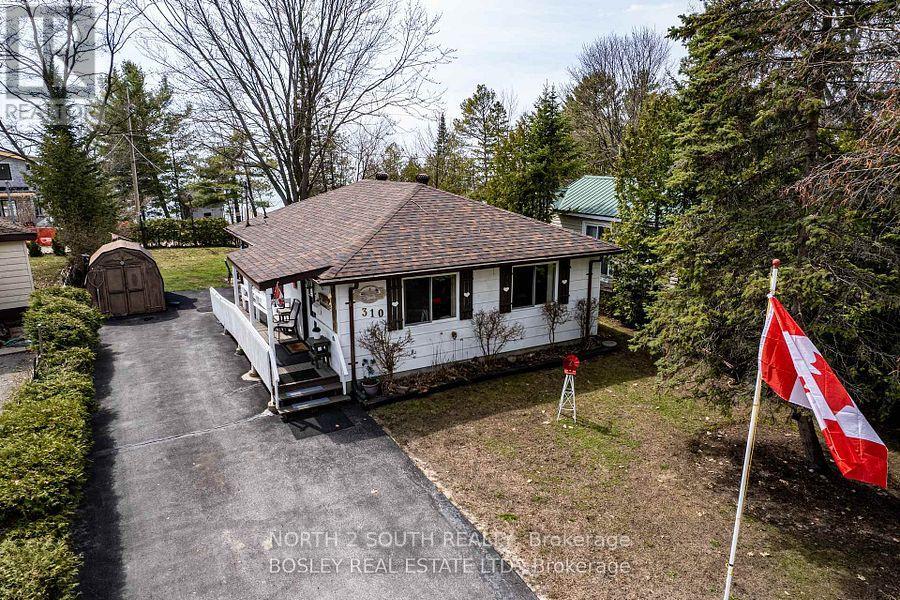 310 Tiny Beaches Road S, Tiny, Ontario  L0L 2J0 - Photo 1 - S13814492