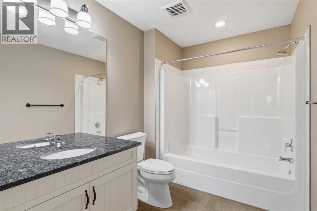 300 Aspenmere Way, Chestermere, Alberta  T1X 0Y2 - Photo 38 - A2345134