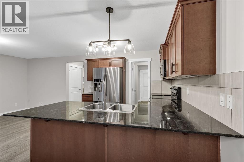 135 Kingsbridge Road SE, Airdrie, Alberta  T4A 0M2 - Photo 8 - A2344003