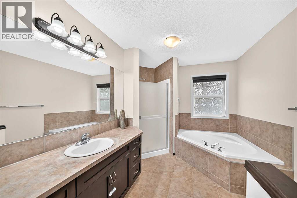 27 Pantego Way NW, Calgary, Alberta  T3K 0C3 - Photo 27 - A2345928