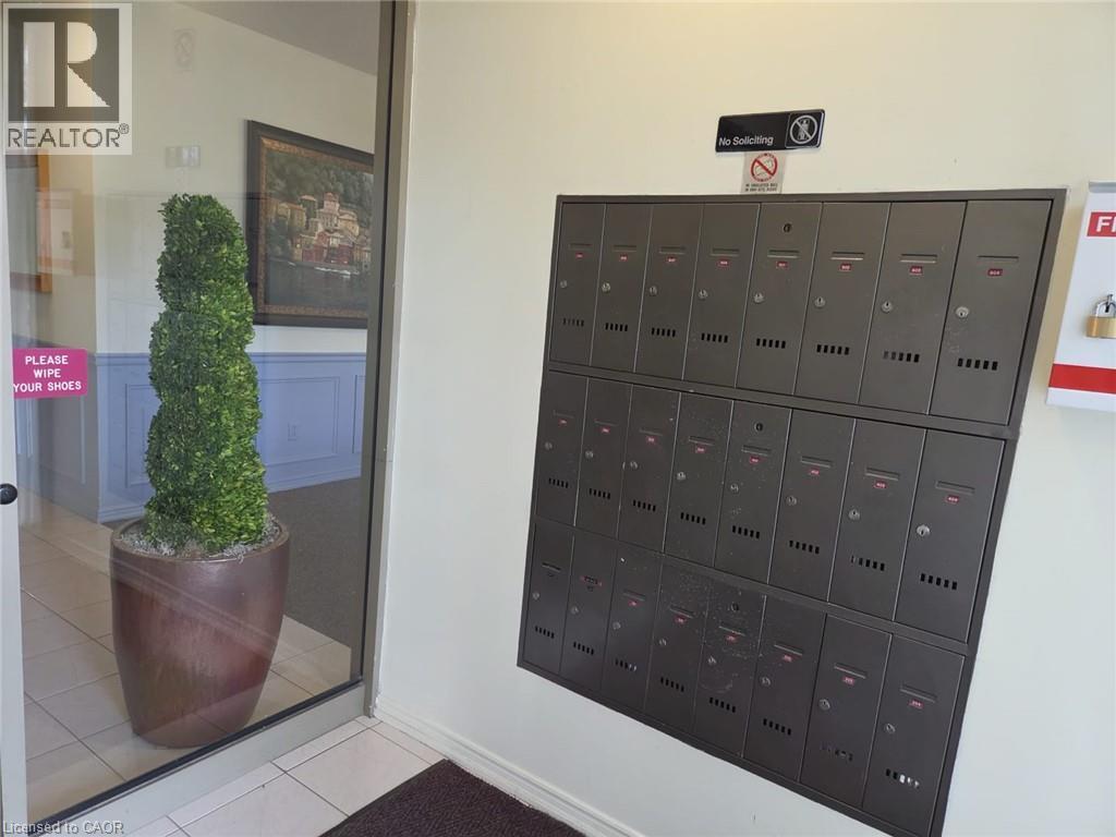 240 Quigley Road Unit# 201, Hamilton, Ontario  L8K 5M9 - Photo 3 - 40865679