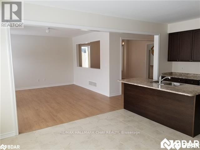 232 Brownley Lane, Essa, Ontario  L3W 0P7 - Photo 4 - N13817016