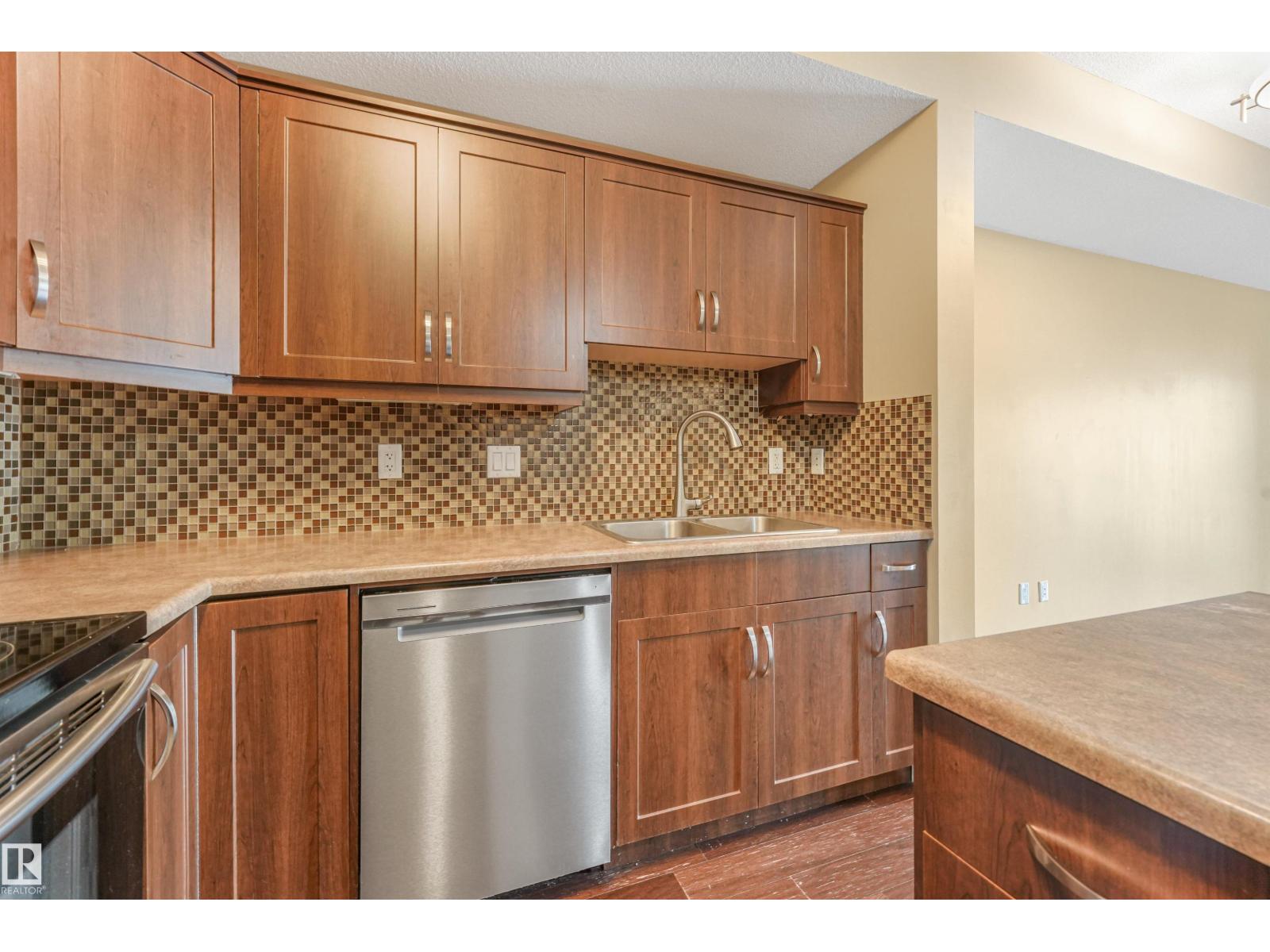 #214 8730 82 AV NW photo 3