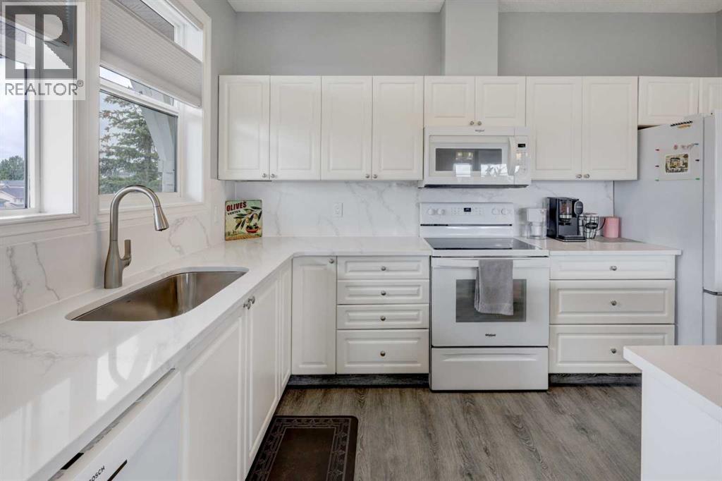 1305, 1010 Arbour Lake Road NW, Calgary, Alberta  T3G 4Y8 - Photo 4 - A2346333