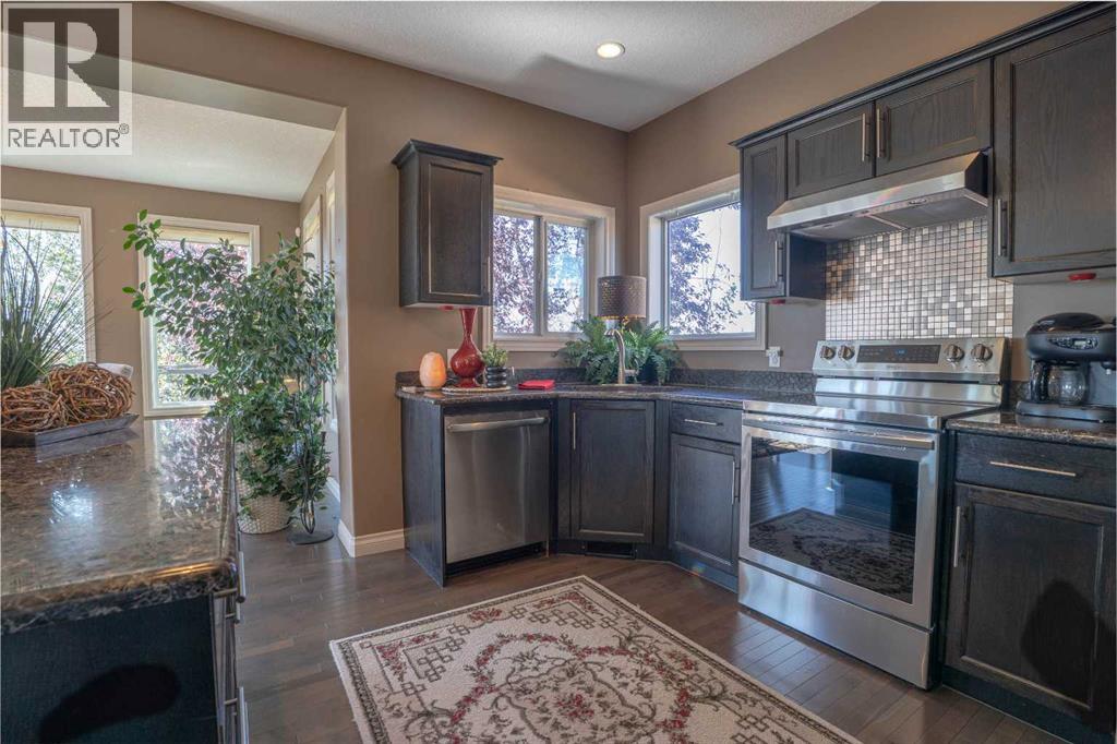 460 Sunset Link, Crossfield, Alberta  T0M 0S0 - Photo 14 - A2347495