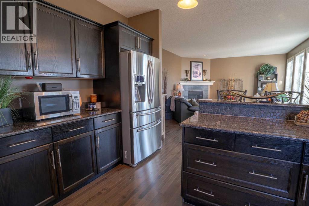460 Sunset Link, Crossfield, Alberta  T0M 0S0 - Photo 10 - A2347495