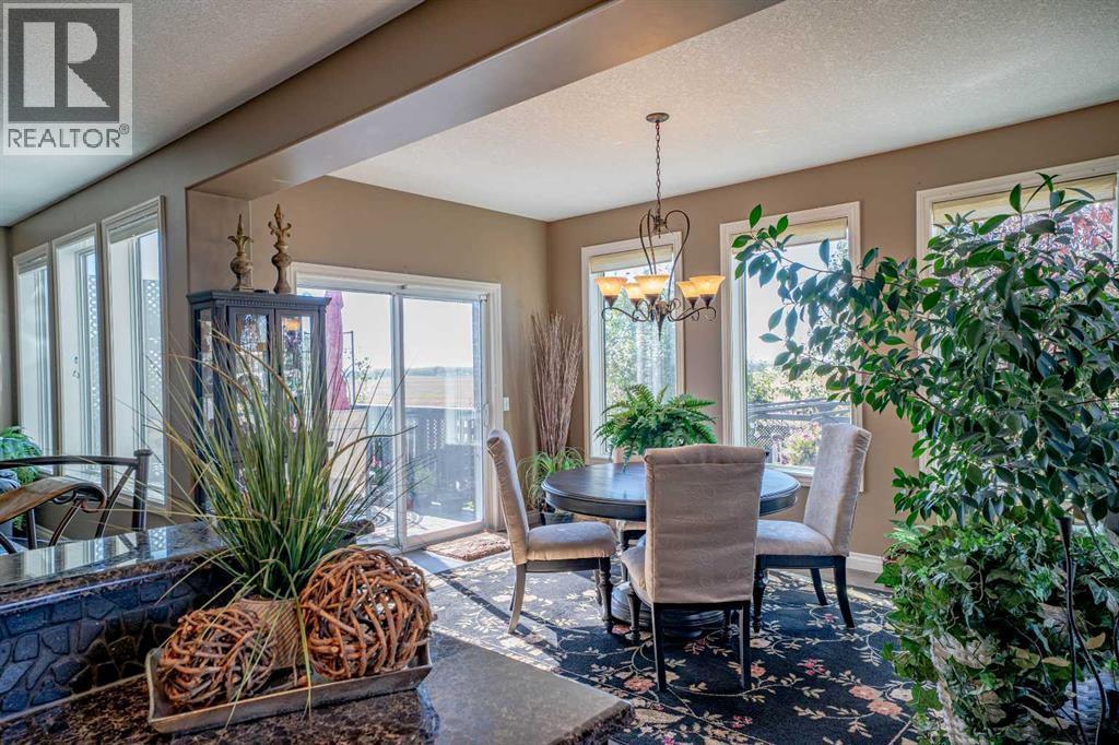 460 Sunset Link, Crossfield, Alberta  T0M 0S0 - Photo 16 - A2347495