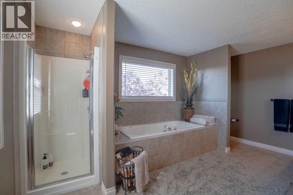460 Sunset Link, Crossfield, Alberta  T0M 0S0 - Photo 36 - A2347495